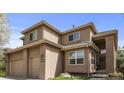 Beautiful two-story home featuring a two-car garage, neutral stucco exterior, and well-maintained landscaping at 6584 S Sedalia St, Aurora, CO 80016