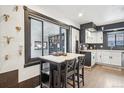 Eat-in dining area next to sliding glass door that provides plenty of natural light at 1325 S Clermont St, Denver, CO 80222