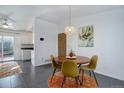 Inviting dining area with direct access to the kitchen and outdoor living space at 4922 S Salida Ct, Aurora, CO 80015
