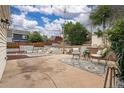 Inviting backyard patio featuring comfortable wicker seating, a stylish rug, and a beautifully designed outdoor space at 116 N Gilbert St, Castle Rock, CO 80104