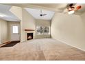 Bright and airy living room features high ceilings and a classic fireplace at 9183 W Cedar Dr # 2, Lakewood, CO 80226