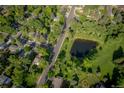 Breathtaking aerial view of the property and the surrounding lush neighborhood at 7150 S Curtice St, Littleton, CO 80120