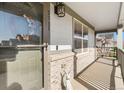 Close-up of the front porch, showcasing the home's entrance with stylish accents at 2331 Ance St, Strasburg, CO 80136