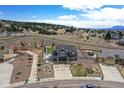 Beautiful home with a large lot, fenced yard, and spacious driveway in a desirable neighborhood at 795 Woodmoor Acres Dr, Monument, CO 80132