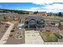 Beautiful home with a large lot, fenced yard, and spacious driveway in a desirable neighborhood at 795 Woodmoor Acres Dr, Monument, CO 80132
