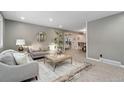 Spacious living room with contemporary furnishings and neutral tones at 14059 W 5Th Ave, Golden, CO 80401