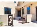 Inviting entrance featuring custom gates and a view of the front door at 5668 Red Fern Ct, Littleton, CO 80125
