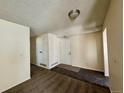 Hallway featuring a neutral color palette and tile flooring at entry at 12470 E Cornell Ave # 203, Aurora, CO 80014