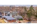 An aerial view of a cozy home nestled in a neighborhood with beautiful mountain views at 4325 Perry St, Denver, CO 80212