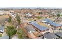 A high-angle shot showing a house with the property lines marked with a red line at 4325 Perry St, Denver, CO 80212