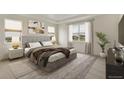Spacious primary bedroom featuring lots of natural light, tray ceiling, and neutral-toned walls at 1818 Sawtooth Mountain Dr, Berthoud, CO 80513