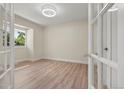 Office space featuring modern light fixture and natural light at 308 Oswego St, Aurora, CO 80010