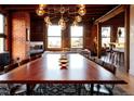 Elegant dining room with large table, stylish lighting and beautiful views at 1628 14Th St # 6A, Denver, CO 80202