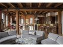 Bright, open floor plan with exposed beams, brick walls and modern furnishings at 1628 14Th St # 6A, Denver, CO 80202