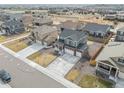 Aerial view of a residential neighborhood featuring well-maintained homes and landscaping at 8388 E 132Nd Pl, Thornton, CO 80602