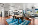 Open-concept living space showcasing a modern kitchen, dining area, and comfortable living room at 1353 Quaker St, Golden, CO 80401
