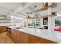 Stylish kitchen with modern island, sleek countertops, and bright, airy design at 1423 S Eudora St, Denver, CO 80222