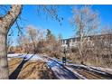 Walking path with trees and building in the background at 309 E Highline Cir # 103, Centennial, CO 80122