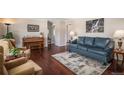 Inviting living room with hardwood floors, comfortable seating, and stylish decor at 19260 Spring Valley Rd, Monument, CO 80132