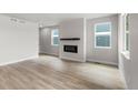 Clean and modern living room with a minimalist design and ample natural light at 4543 Cholla Trl, Castle Rock, CO 80104
