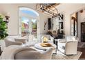 Relaxing wine room with French doors leading to the backyard at 4541 Tierra Alta Dr, Castle Rock, CO 80104