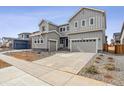 Inviting two-story home with a spacious driveway and well-maintained front yard at 2560 Wesley Ln, Lafayette, CO 80026