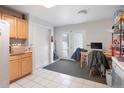 Cozy breakfast nook featuring built-in cabinets and bright double doors at 3390 S Elm St, Denver, CO 80222