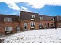 Charming brick townhome exterior with unique architectural details at 5747 S Lowell Blvd, Littleton, CO 80123