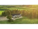 Stunning aerial view of a home, showcasing expansive lawns and a private setting at 1752 Private Road 130, Elizabeth, CO 80107