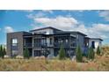 Contemporary home with a spiral staircase and expansive views at 5191 Lions Paw St, Castle Rock, CO 80104
