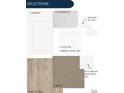 Selection of interior finishes featuring modern cabinets, countertops, floor tile, and carpet samples at 8628 Hotchkiss St, Littleton, CO 80125