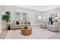 Inviting living room with neutral decor, natural light, and stylish furnishings at 7204 W 26Th Ave, Lakewood, CO 80214