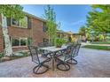 Outdoor patio with a table and six chairs, perfect for entertaining or relaxing at 3175 S Gilpin St, Englewood, CO 80113