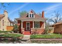 Beautiful brick home with a welcoming front porch and lovely landscaping at 2772 Julian St, Denver, CO 80211