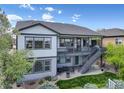 Two-story home with a deck and patio, perfect for outdoor entertaining and relaxation at 15046 Verbena St, Thornton, CO 80602