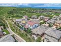 Beautiful two-story home with a neutral color scheme and well-maintained landscaping at 9724 Cantabria Pt, Lone Tree, CO 80124