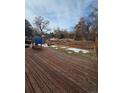 Spacious backyard with a large wood deck, great for outdoor activities and gatherings at 5221 E Prescott Ave, Castle Rock, CO 80104