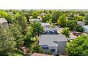 View of the property, showing the backyard and neighborhood at 10262 Spotted Owl Ave, Highlands Ranch, CO 80129