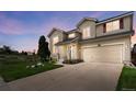 Charming two-story home with landscaped yard and a two-car garage, perfect for suburban living at 408 Sylvestor Trl, Highlands Ranch, CO 80129