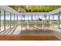 Formal dining room with designer lighting, an expansive view, and modern decor at 5700 S Quebec St # A, Englewood, CO 80111
