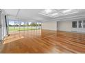 Open living space featuring floor to ceiling windows offering panoramic views, and a unique skylight at 5700 S Quebec St # A, Englewood, CO 80111