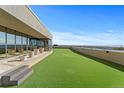 Beautiful rooftop terrace featuring durable artificial turf and an open, airy ambiance at 5700 S Quebec St # A, Englewood, CO 80111