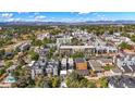 Wide shot of townhome community near mountains at 1256 Newton St # 1, Denver, CO 80204