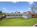Spacious backyard offering ample green space and privacy with a wooden fence at 8731 W 89Th Pl, Broomfield, CO 80021