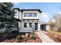 Charming two-story home with well-maintained landscaping and classic architectural details at 265 S Monroe St, Denver, CO 80209
