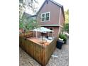 Cozy fenced-in backyard featuring a private deck area, perfect for outdoor entertaining and relaxation at 1240 S Flower Cir # A, Lakewood, CO 80232
