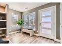 Bright and airy entryway with built-in shelving at 2008 Galapago, Denver, CO 80223