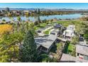 Beautiful aerial shot of the house surrounded by greenery, a neighborhood, and lake views at 1901 Meade St, Denver, CO 80204