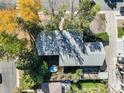Overhead view of the home showing the roofline, garden, and surrounding mature trees at 1901 Meade St, Denver, CO 80204