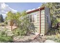 Side view of a ranch home showcasing its wood siding at 2825 Elm Ave, Boulder, CO 80305